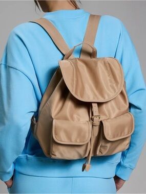 Coach Necklace, Taupe Year of Ours Back Pack, Liquid Liner & Personal Trimmer